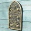 Dorset Rustic Arch Scroll Design Metal Garden Mirror